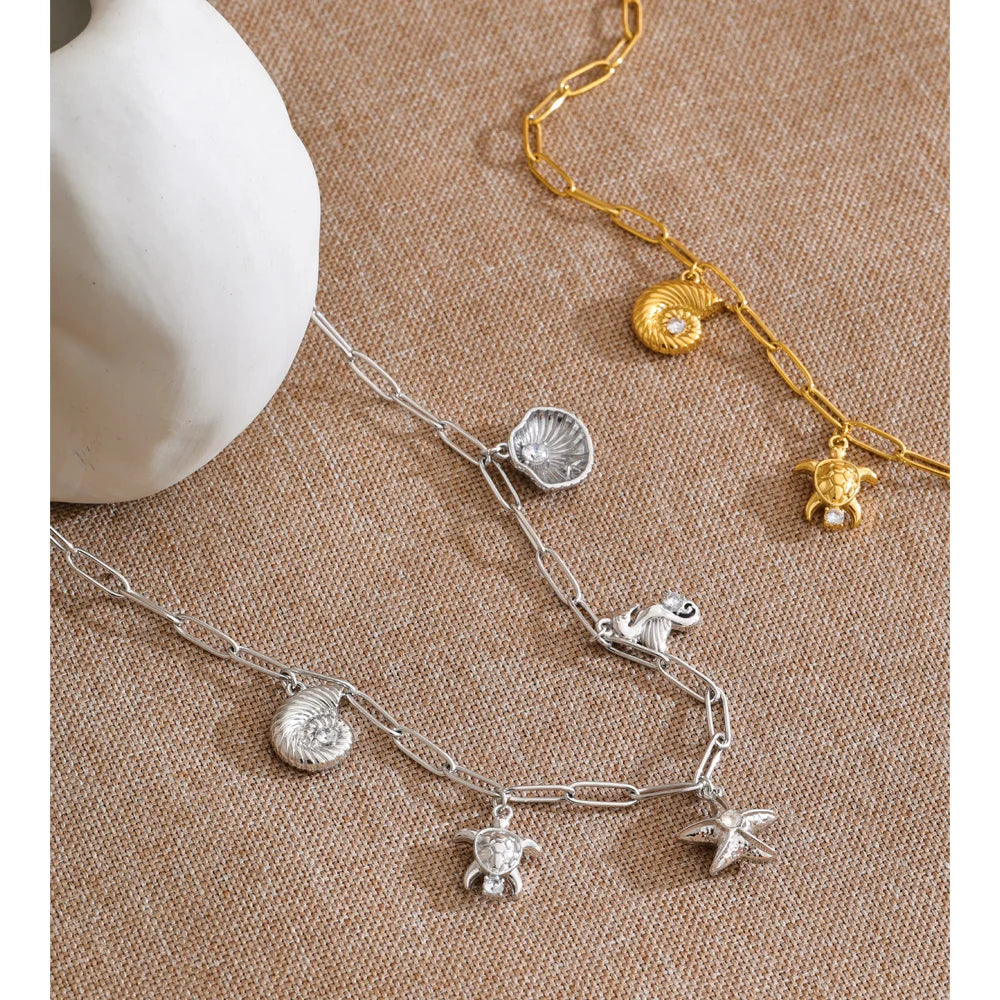 Colar com Pingente de Concha e Estrela-do-mar da Série Ocean Yhpup em Aço Inoxidável com Zircônia, Banhado a Ouro 16K e PVD Platina, Joia de Verão