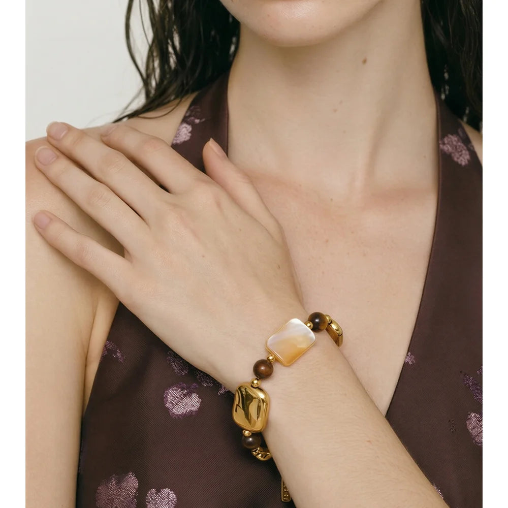 Pulseira Artesanal de Aço Inoxidável Yhpup com Concha Natural e Pedra Olho de Tigre – Joia Exquisita e Charmosa Feita à Mão